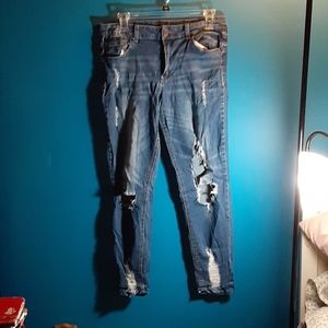 Ripped Mid Rise Jeans